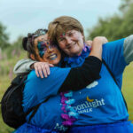 Two female participants enjoying the Moonlight Walk